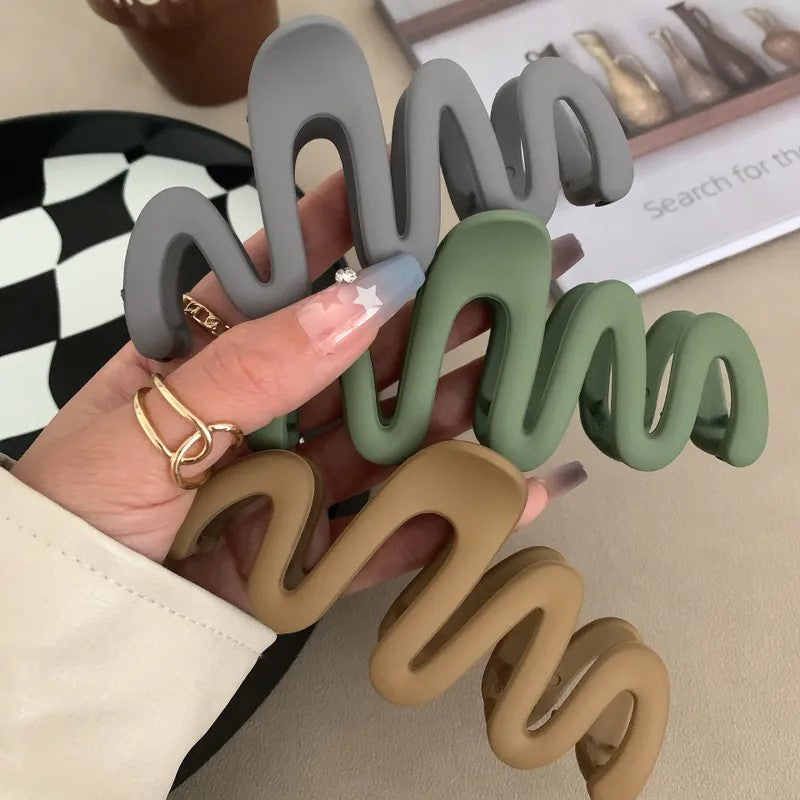 Women-s-Simple-Style-Waves-Plastic-Resin-Hair-Claws (1).jpeg