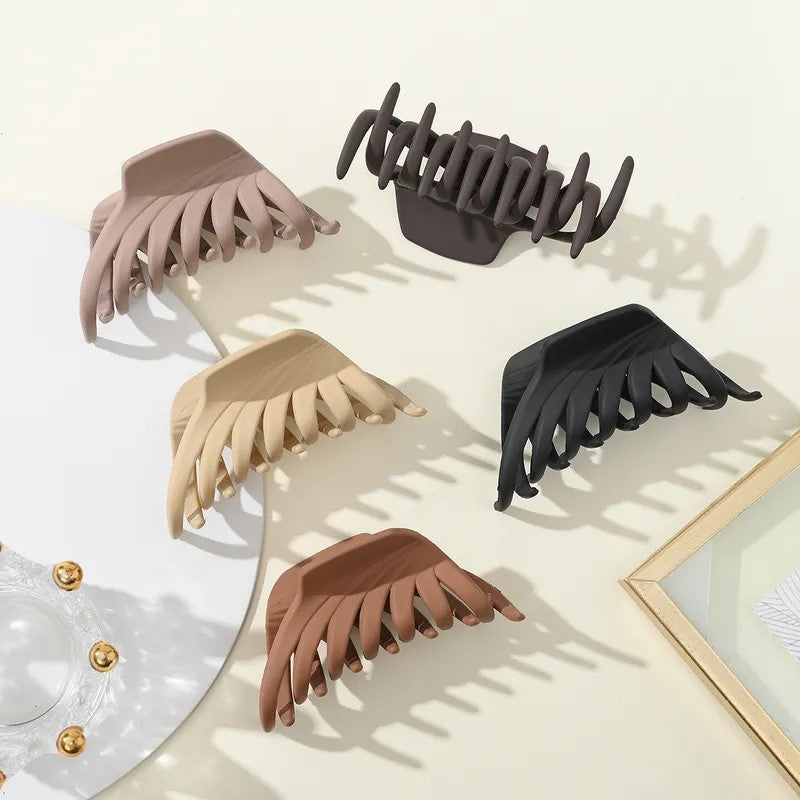 Women-s-Simple-Style-Geometric-Plastic-Stoving-Varnish-Hair-Claws (1).jpeg