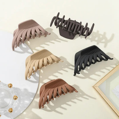 Women-s-Simple-Style-Geometric-Plastic-Stoving-Varnish-Hair-Claws (1).jpeg